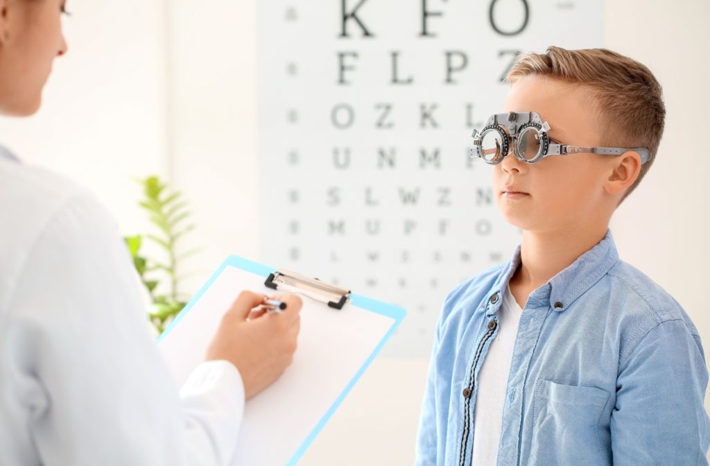 A child undergoes an eye exam for astigmatism.