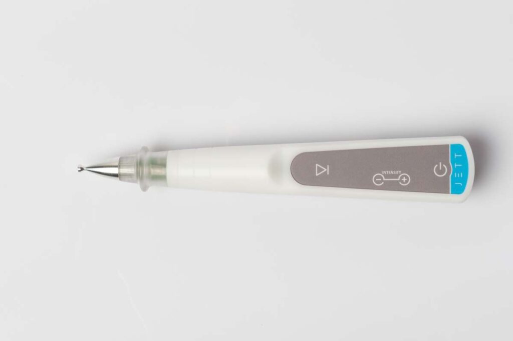 Jett Plasma Pen device with silver microcurrent tip used for eyelid and dry eye treatment.